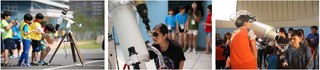 Children look through telescopes